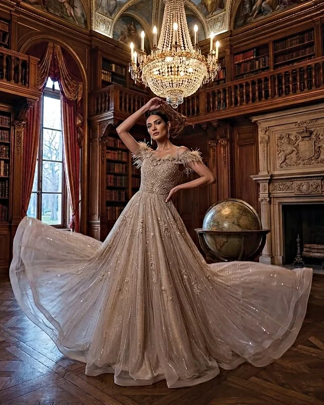 Aurelia Champagne Feathered Trail Gown